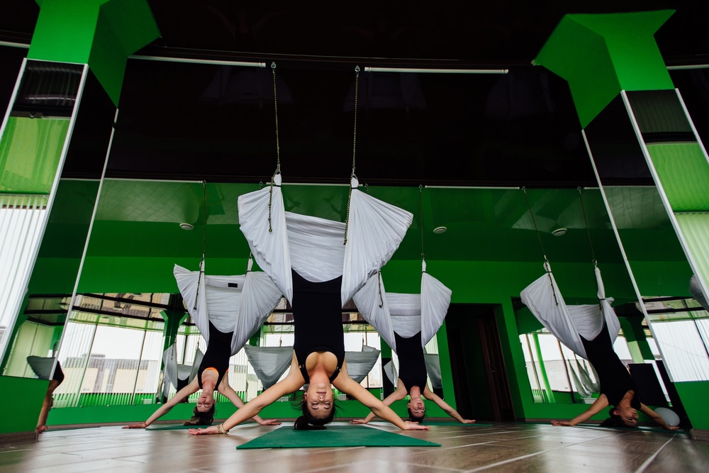 what is the history of aerial yoga